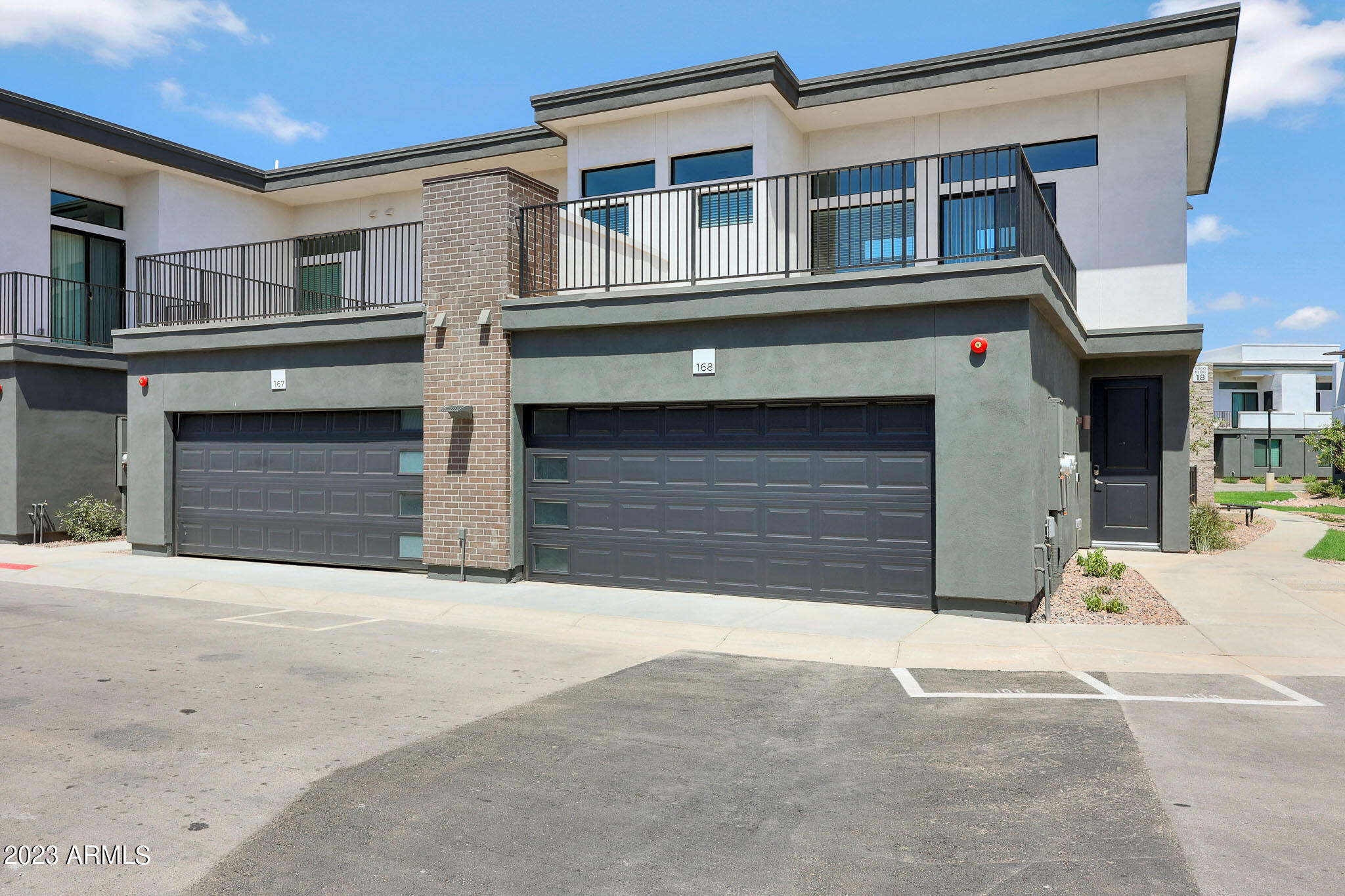 6060 East Baseline Road, Unit 103 Mesa, AZ 85206 - Photo 9 of 45 a house with a entrance gate