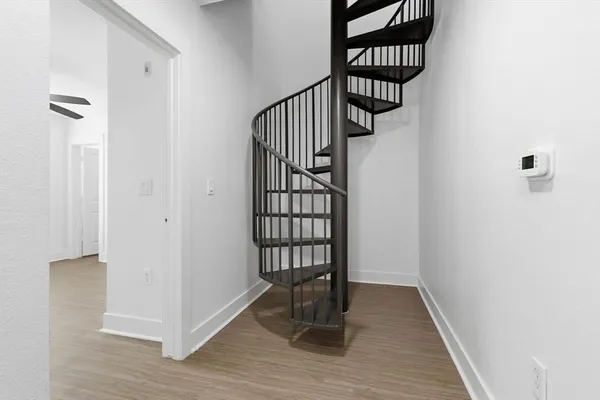 a view of entryway with wooden floor