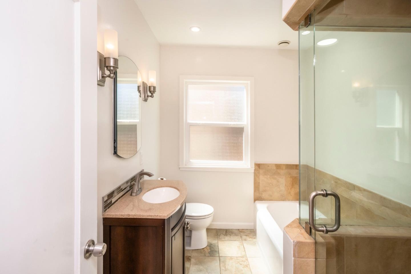 540 Sylvan Avenue San Mateo, CA 94403 - Photo 18 of 23 a bathroom with a sink toilet and shower