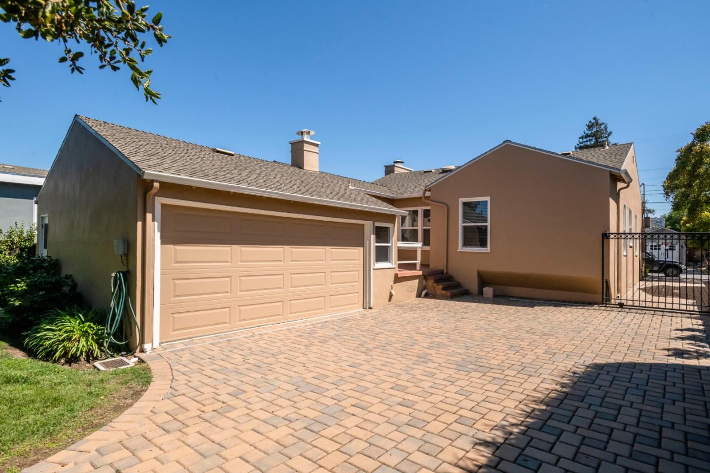 540 Sylvan Avenue San Mateo, CA 94403 - Photo 23 of 23 a backyard of a house with yard and garage