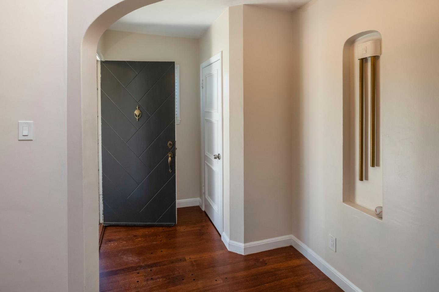 540 Sylvan Avenue San Mateo, CA 94403 - Photo 4 of 23 an empty room with wooden floor and a window