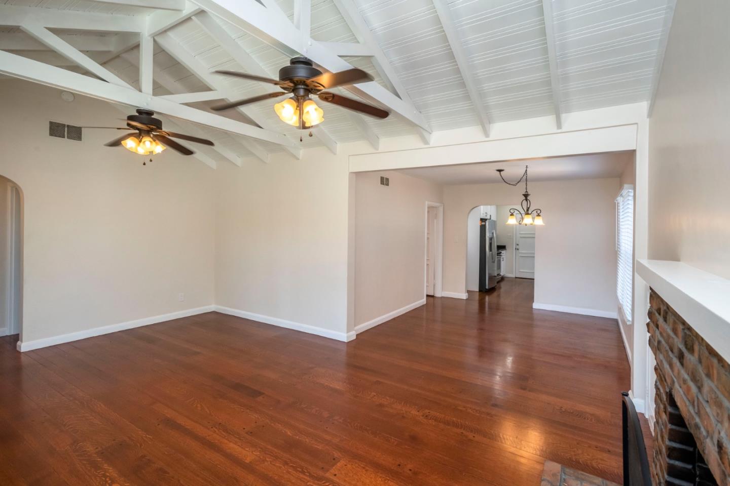 540 Sylvan Avenue San Mateo, CA 94403 - Photo 7 of 23 en empty room with wooden floor