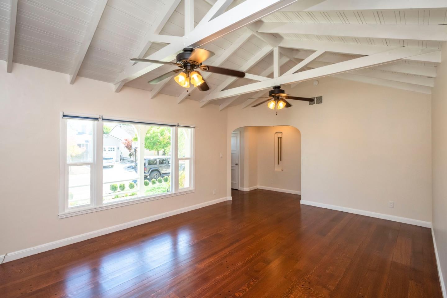 540 Sylvan Avenue San Mateo, CA 94403 - Photo 8 of 23 wooden floor in an empty room with a window