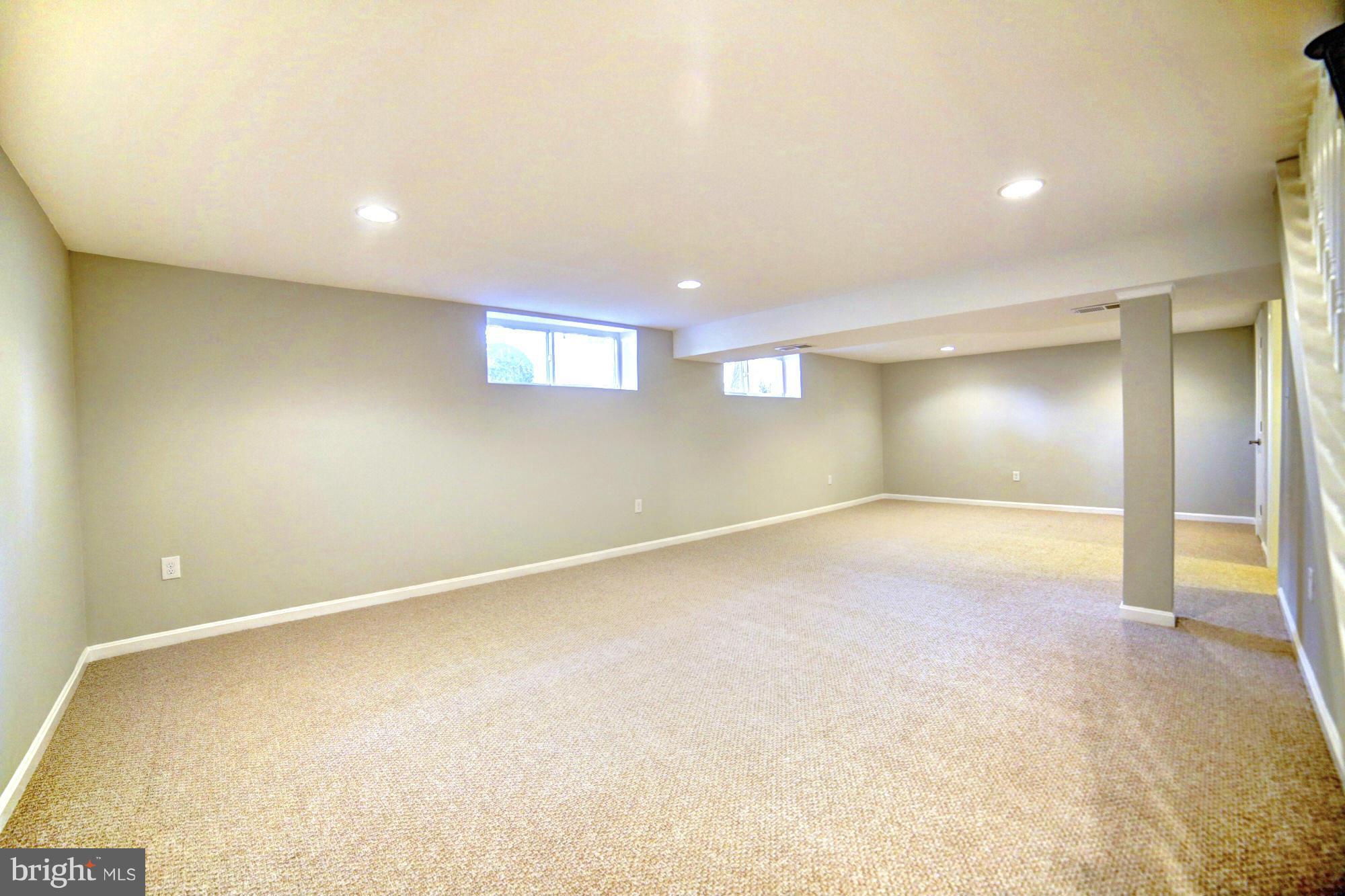 4021 Rouen Road Randallstown, MD 21133 - Photo 17 of 22 an empty room with a empty space and window