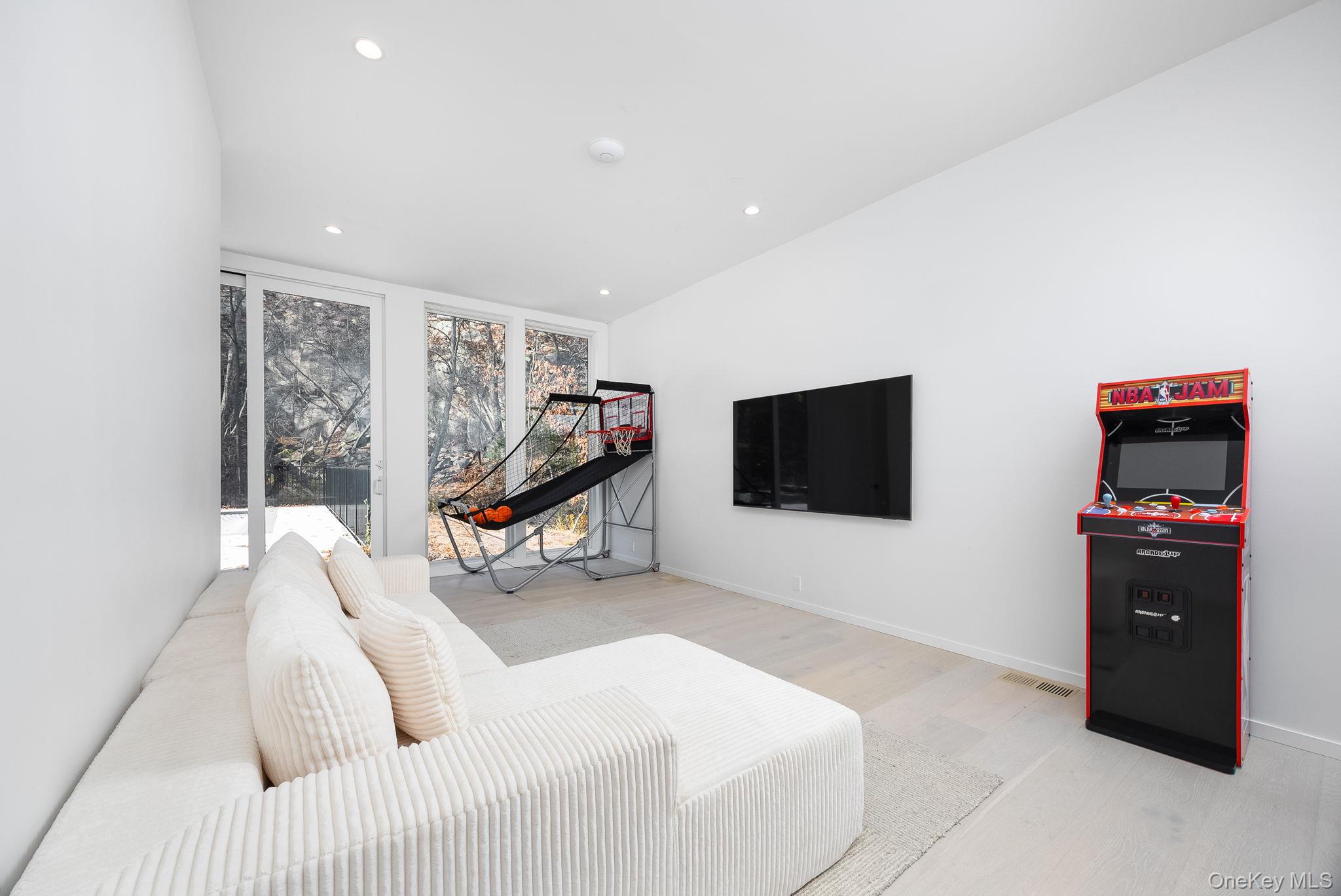 211 Little York Road Warwick, NY 10990 - Photo 14 of 37 a bedroom with furniture and a flat screen tv