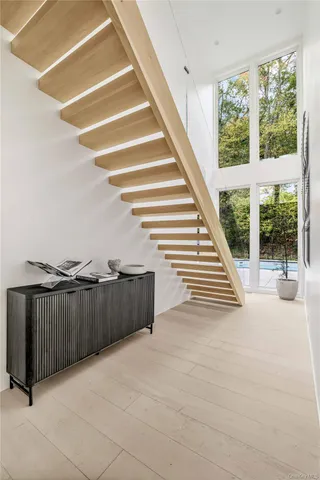 a view of a couches with wooden floor