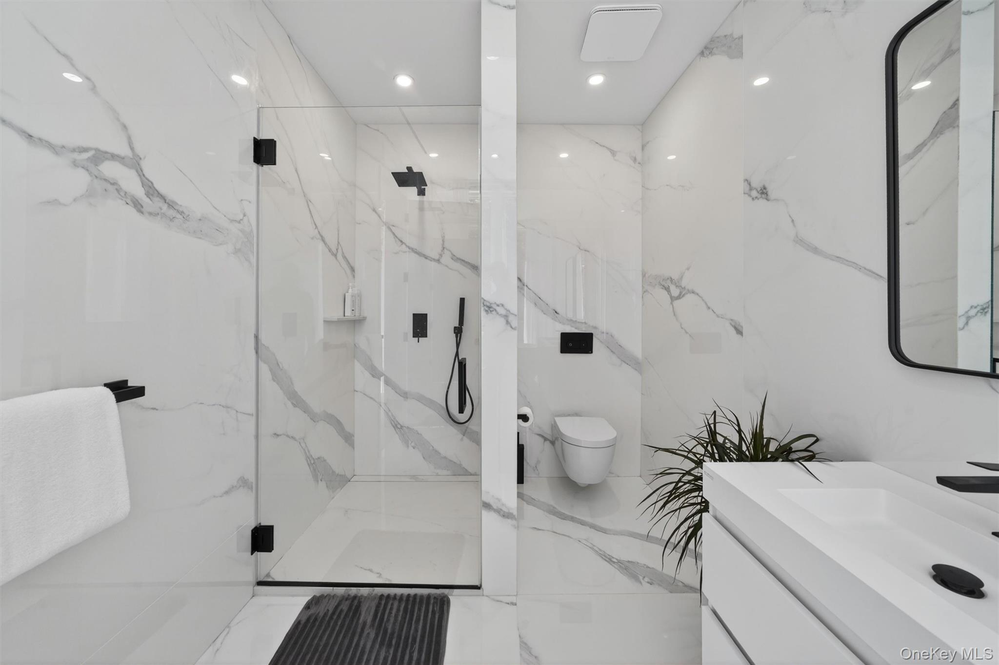 211 Little York Road Warwick, NY 10990 - Photo 21 of 41 a bathroom with a sink a toilet and shower