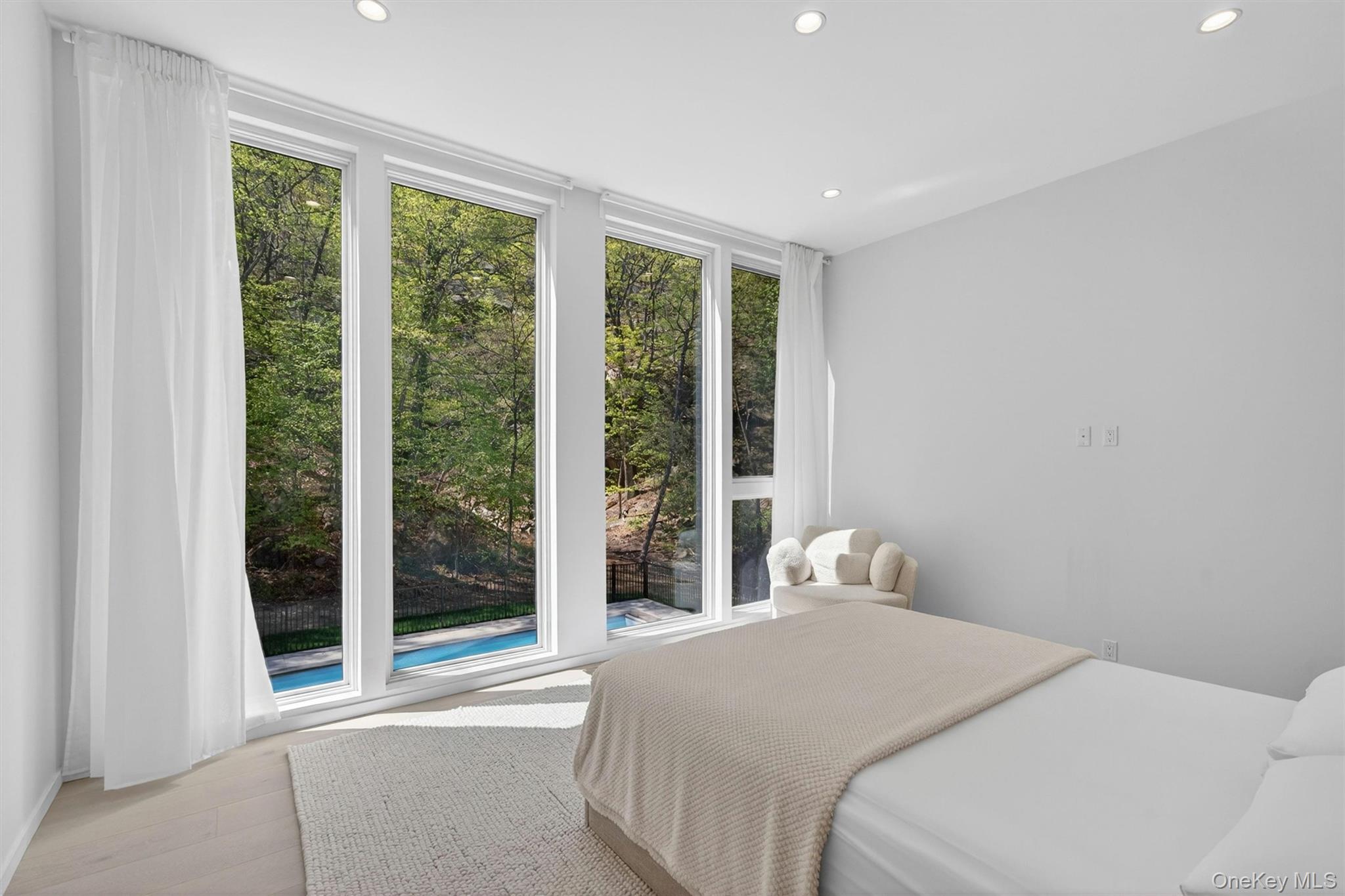 211 Little York Road Warwick, NY 10990 - Photo 23 of 41 a bedroom with a large bed and a large window