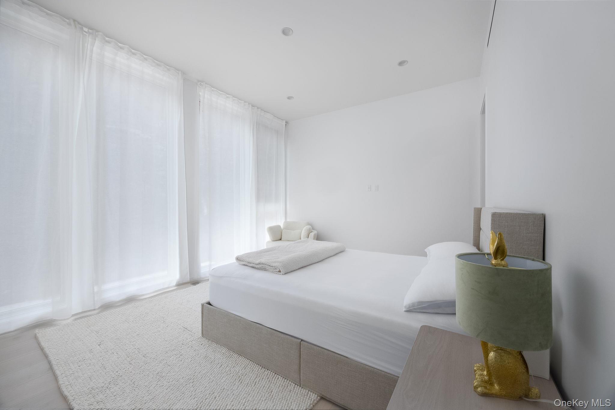 211 Little York Road Warwick, NY 10990 - Photo 24 of 37 a bedroom with a bed and a cabinets