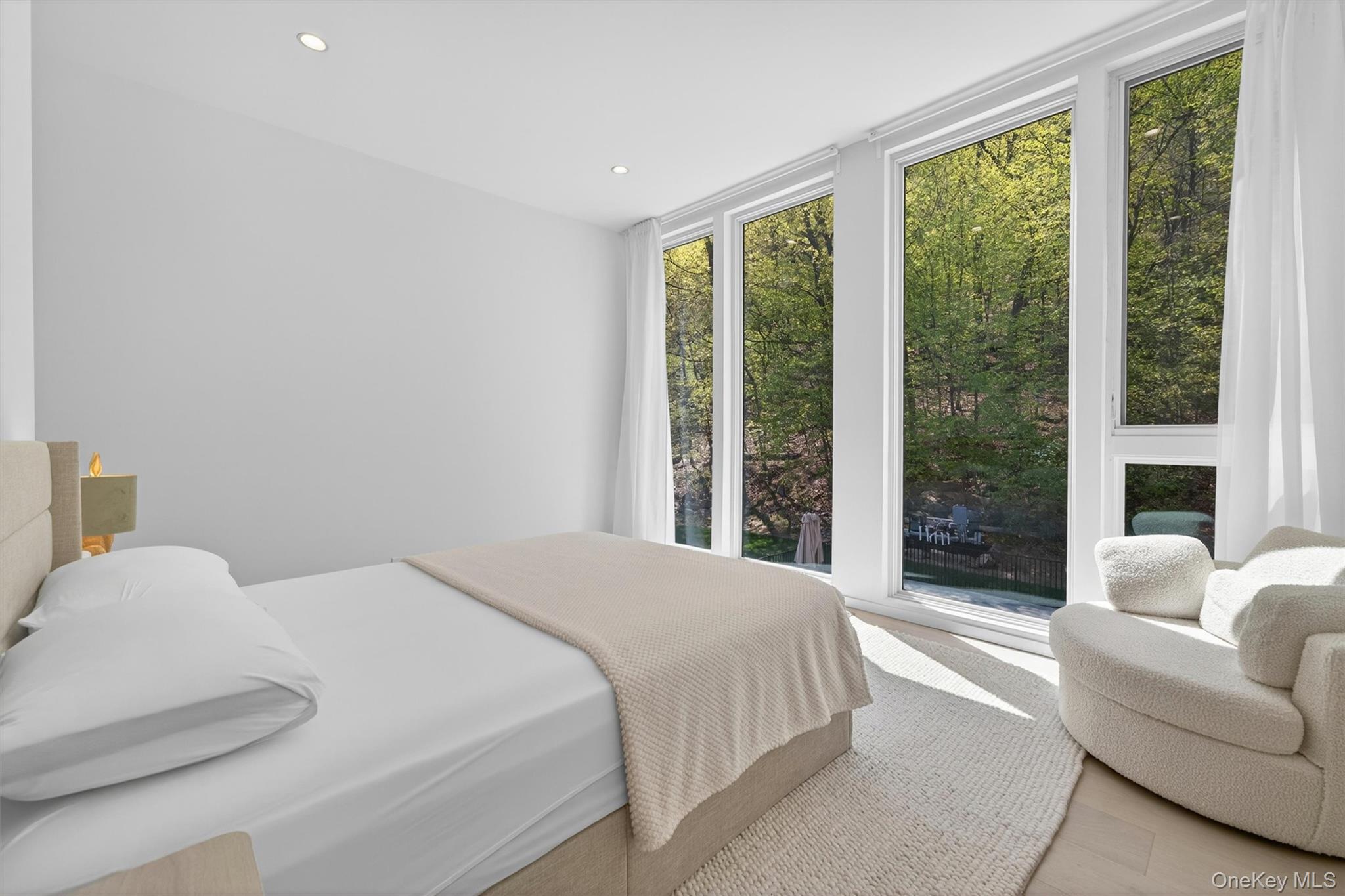 211 Little York Road Warwick, NY 10990 - Photo 25 of 41 a bedroom with a bed and a large window