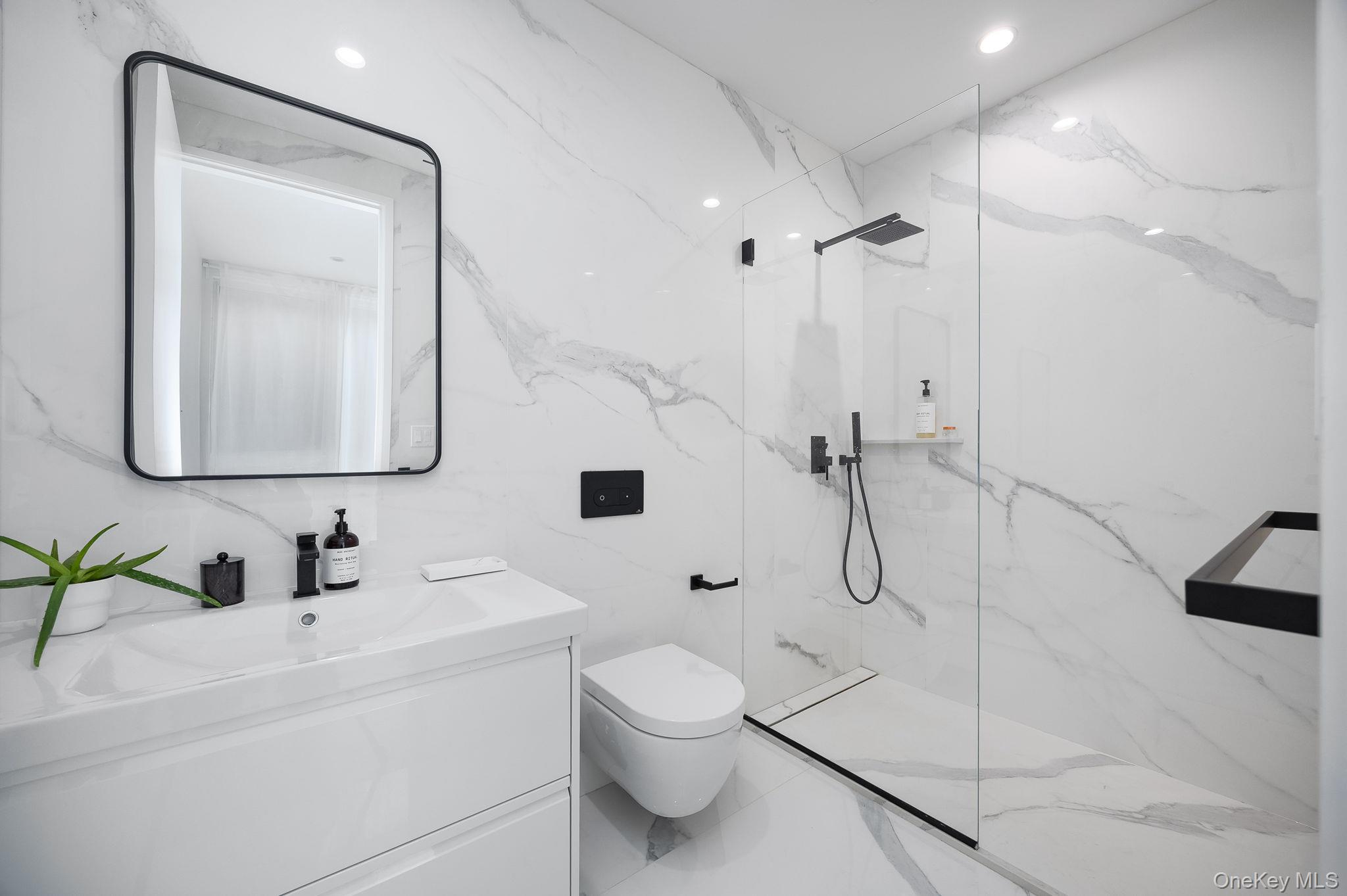 211 Little York Road Warwick, NY 10990 - Photo 25 of 37 a bathroom with a toilet sink and shower