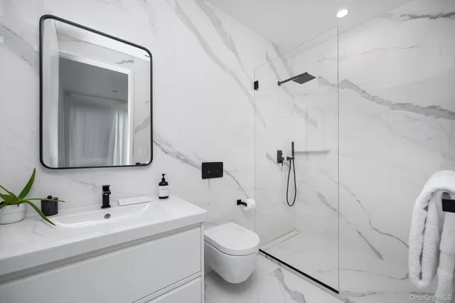 a view of swimming pool with seating area