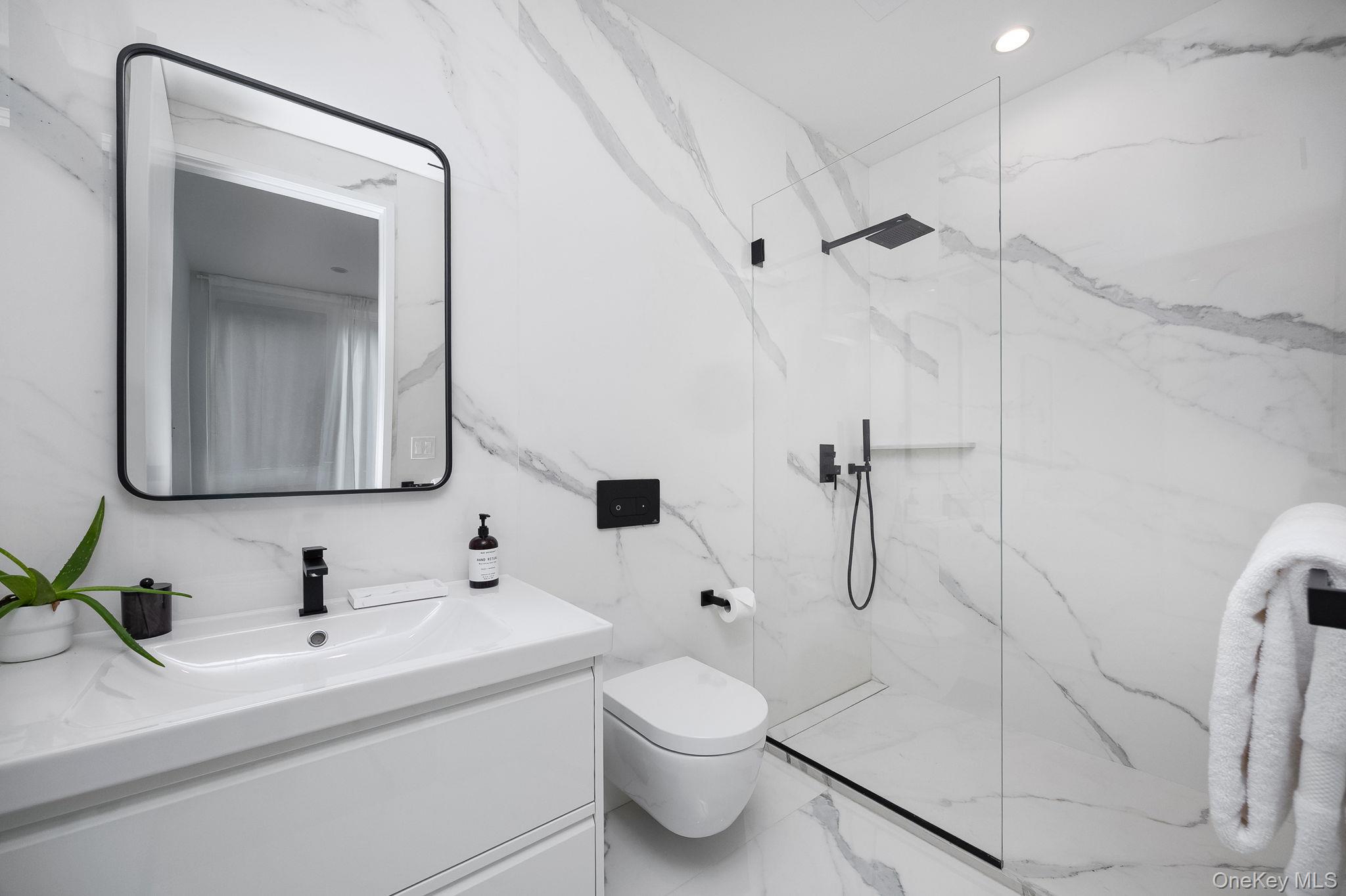 211 Little York Road Warwick, NY 10990 - Photo 27 of 37 a bathroom with a sink toilet and shower