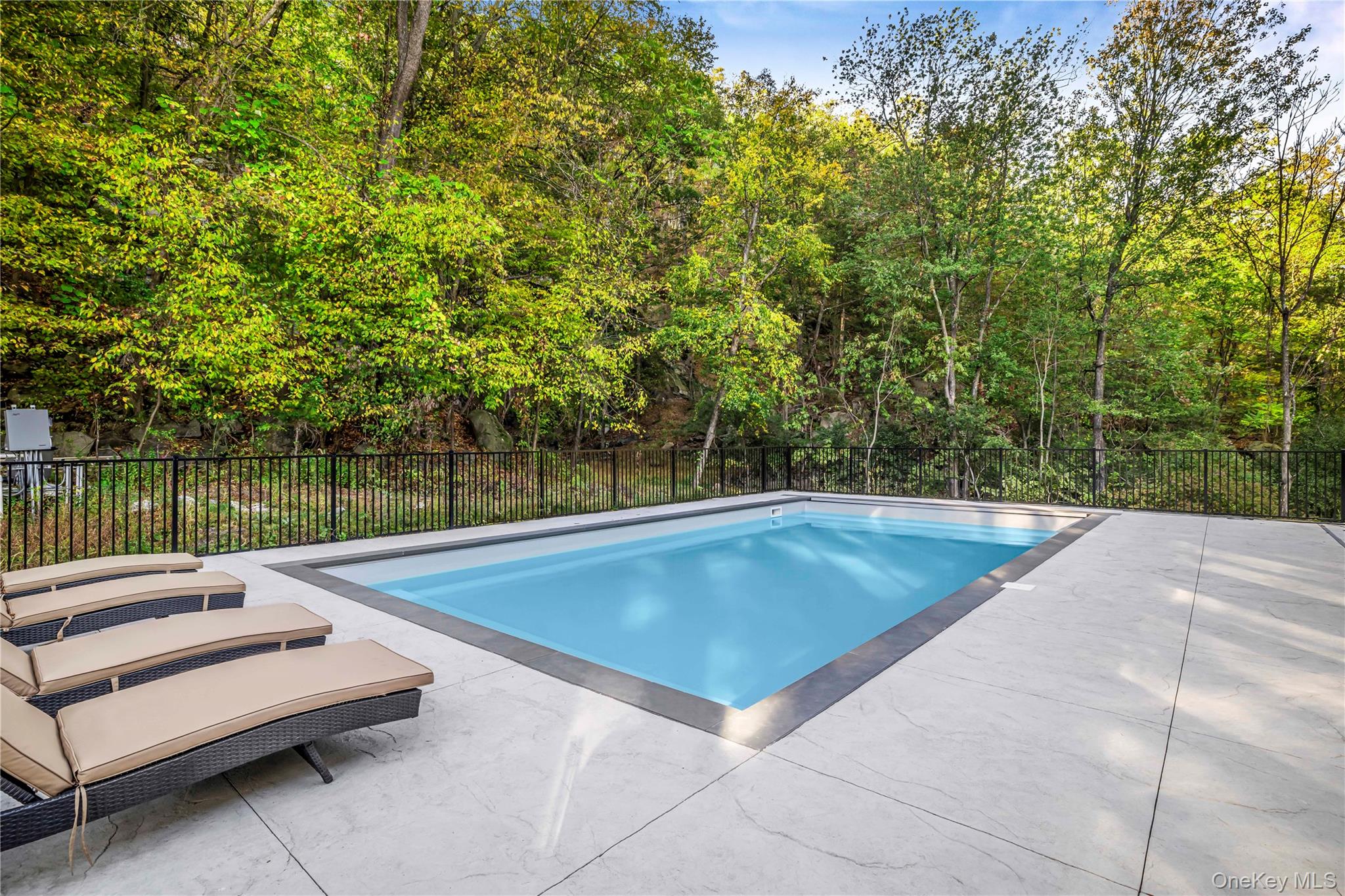 211 Little York Road Warwick, NY 10990 - Photo 31 of 37 a view of a swimming pool with a patio