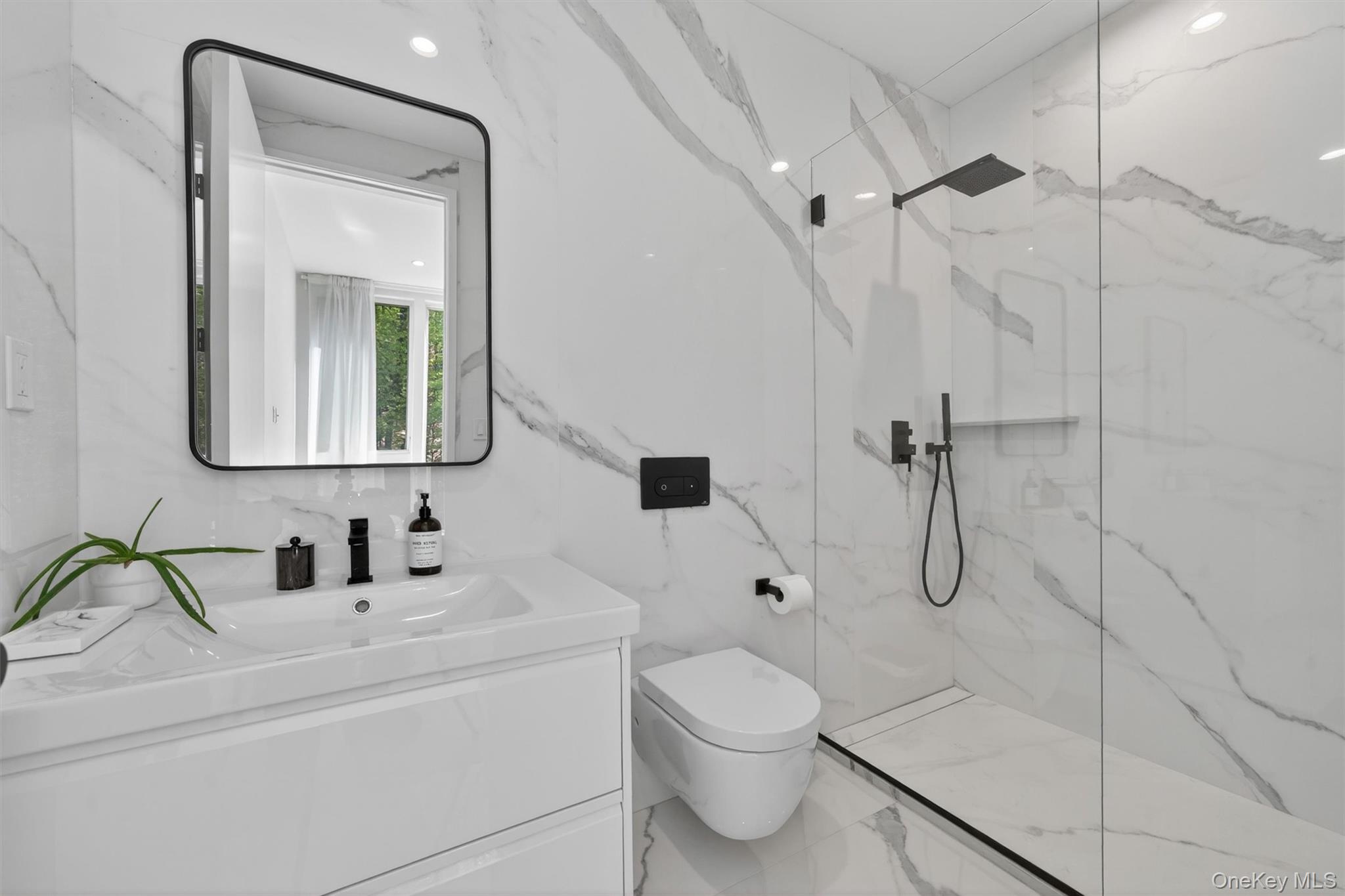 211 Little York Road Warwick, NY 10990 - Photo 32 of 41 a bathroom with a toilet sink shower and mirror