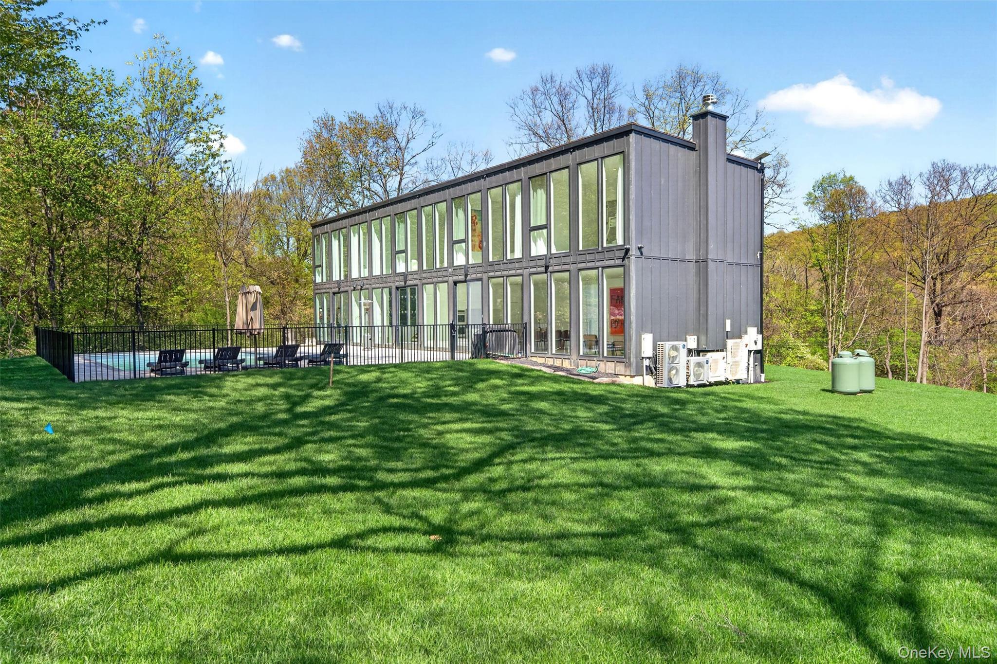 211 Little York Road Warwick, NY 10990 - Photo 36 of 41 a view of a house with a big yard and large trees