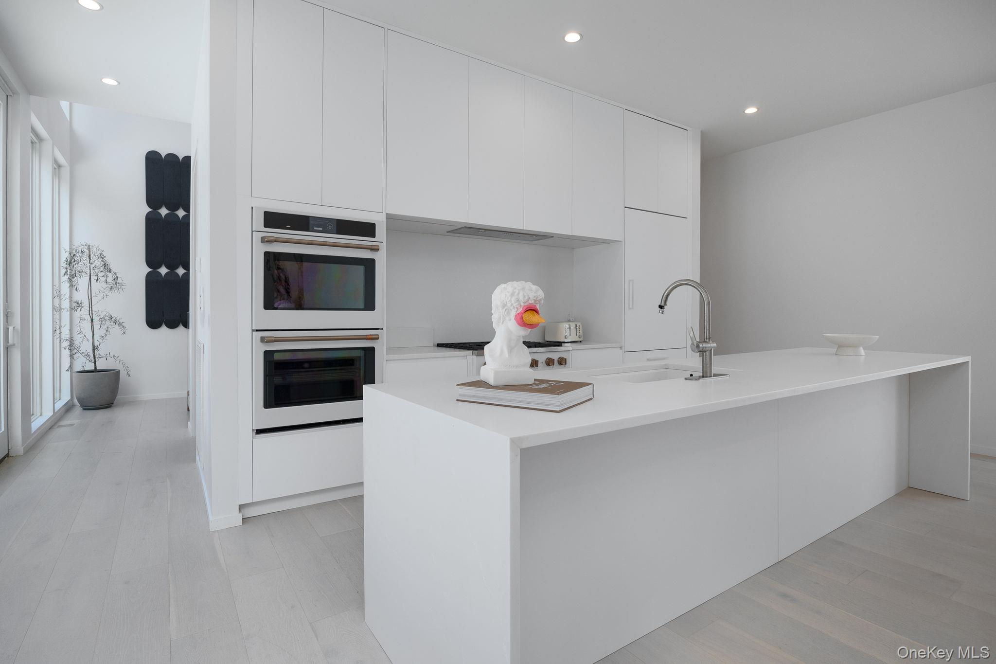 211 Little York Road Warwick, NY 10990 - Photo 10 of 37 a kitchen with stainless steel appliances a sink and a refrigerator