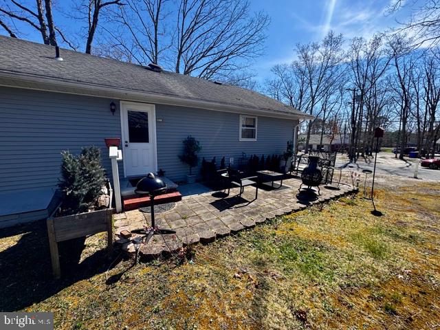 4 Dogwood Road, Unit 29 Manahawkin, NJ 08050 - Photo 30 of 31 Charming outdoor space for relaxation.
