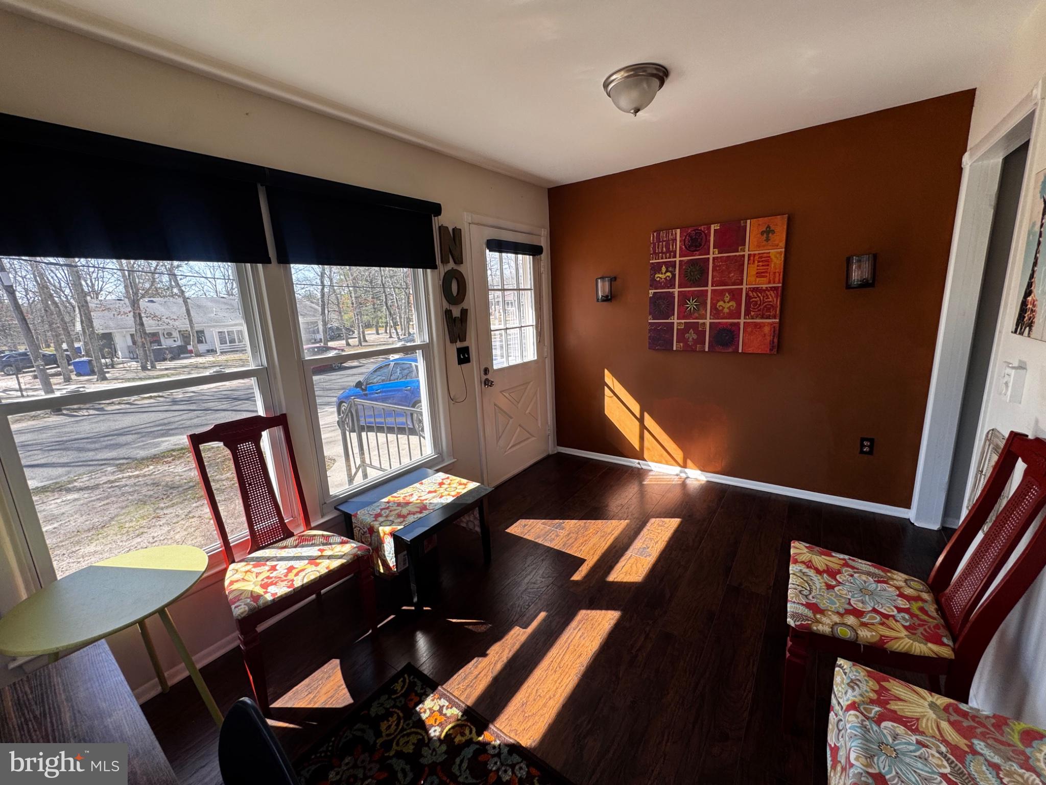 4 Dogwood Road, Unit 29 Manahawkin, NJ 08050 - Photo 7 of 31 Sunlit corner with vibrant decor.