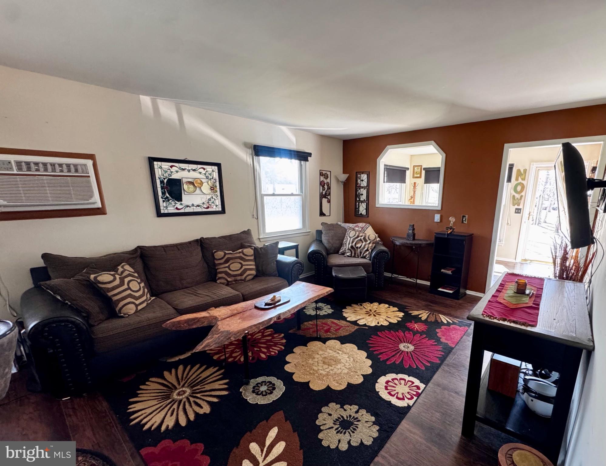 4 Dogwood Road, Unit 29 Manahawkin, NJ 08050 - Photo 9 of 31 Cozy living space with vibrant decor.