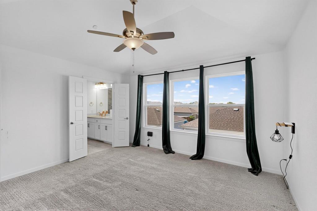 6629 Kort Street Rowlett, TX 75089 - Photo 16 of 39 a view of an empty room with a bathroom