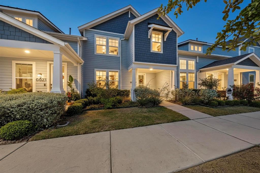 6629 Kort Street Rowlett, TX 75089 - Photo 2 of 39 a front view of a house