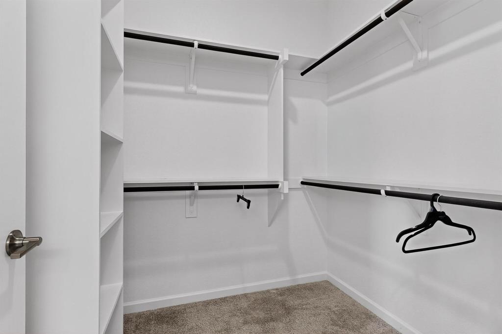 6629 Kort Street Rowlett, TX 75089 - Photo 20 of 39 a view of walk in closet