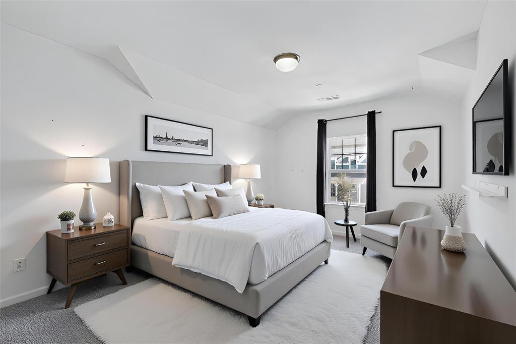 6629 Kort Street Rowlett, TX 75089 - Photo 21 of 39 a bedroom with a bed and wooden floor