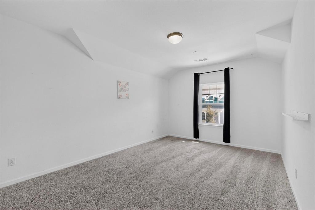 6629 Kort Street Rowlett, TX 75089 - Photo 22 of 39 a view of an empty room with a window