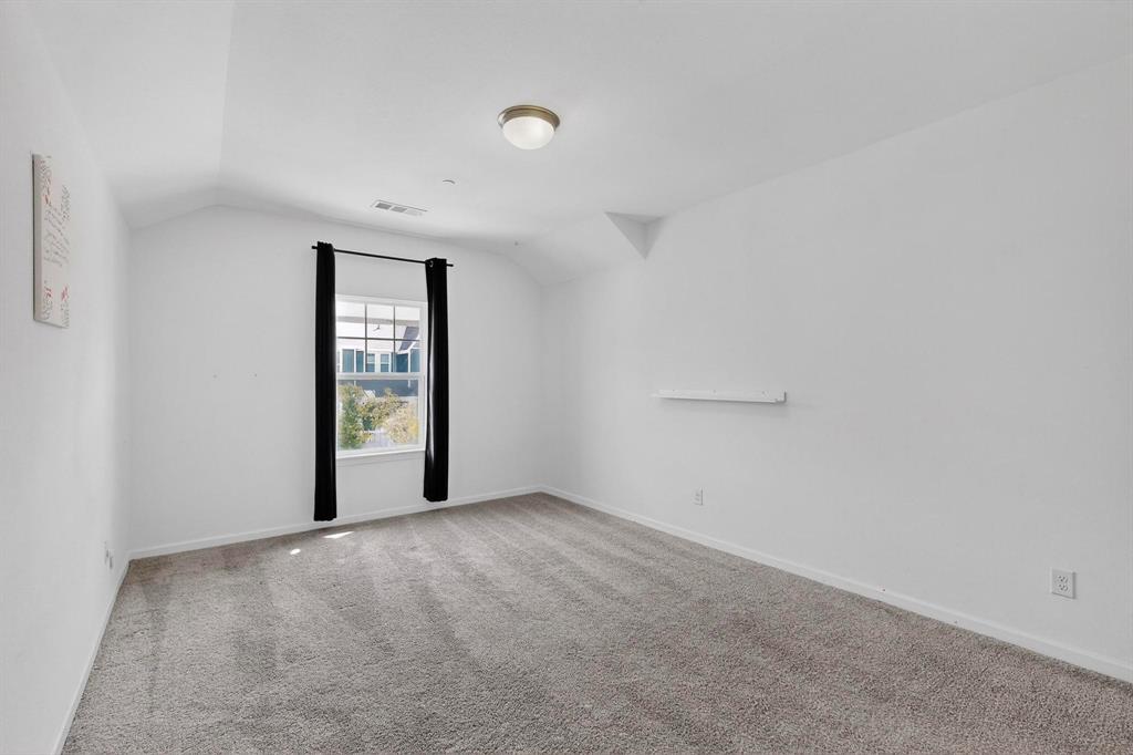 6629 Kort Street Rowlett, TX 75089 - Photo 23 of 39 a view of an empty room with a window