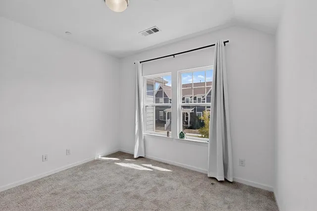 a white bath tub sitting next to a white toilet and sink