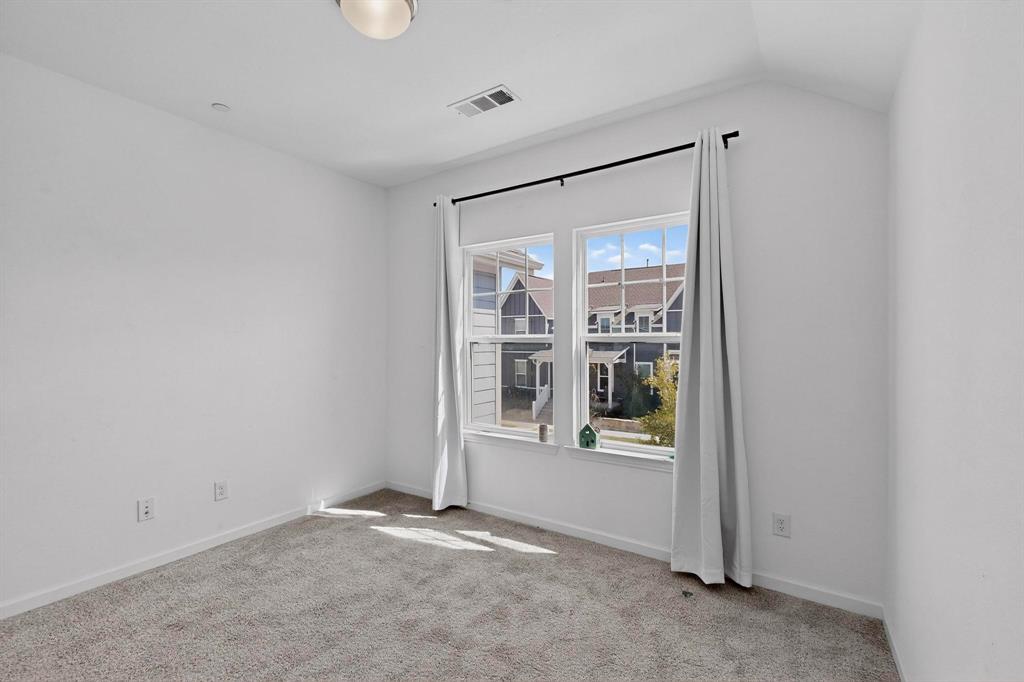 6629 Kort Street Rowlett, TX 75089 - Photo 28 of 39 an empty room with windows