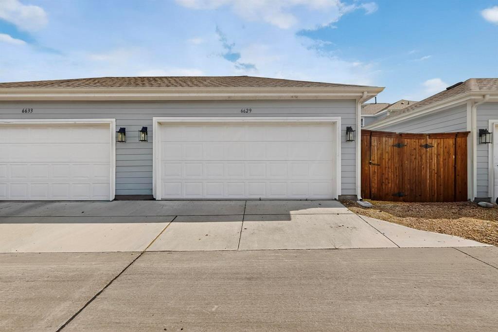 6629 Kort Street Rowlett, TX 75089 - Photo 37 of 39 a front view of a house