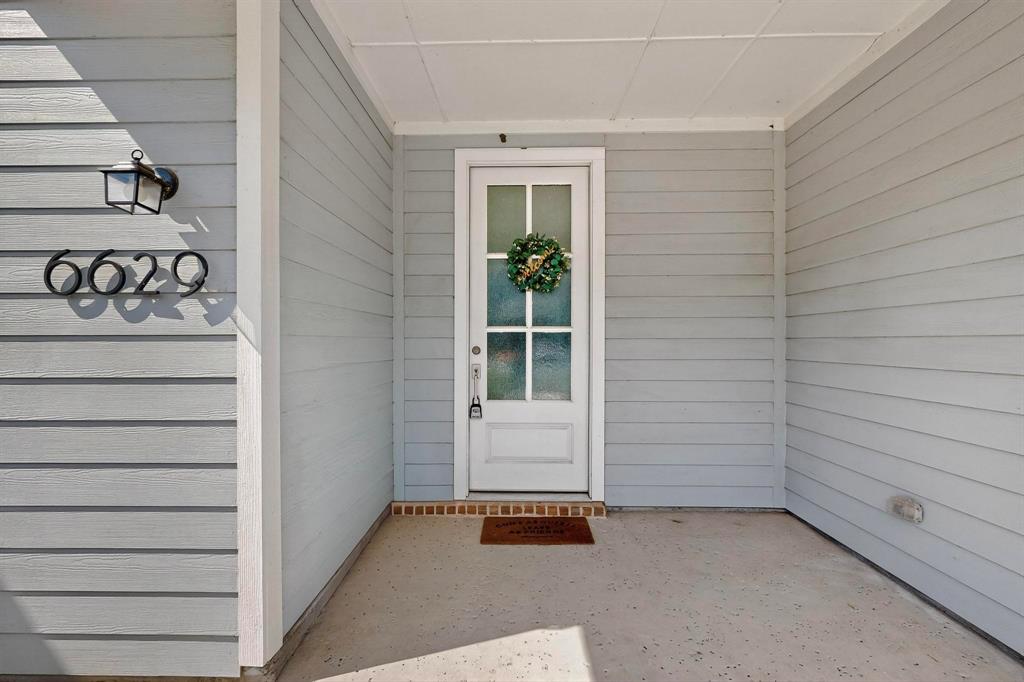 6629 Kort Street Rowlett, TX 75089 - Photo 5 of 39 a view of a door and a window