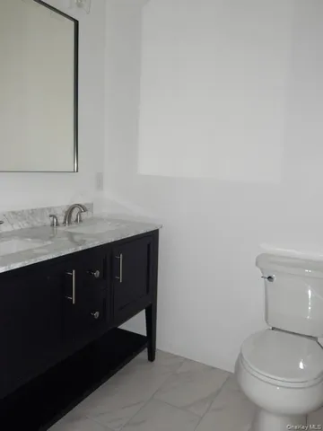 a bathroom with a sink and a toilet