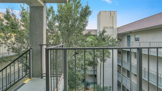 a view of a balcony with an outdoor space