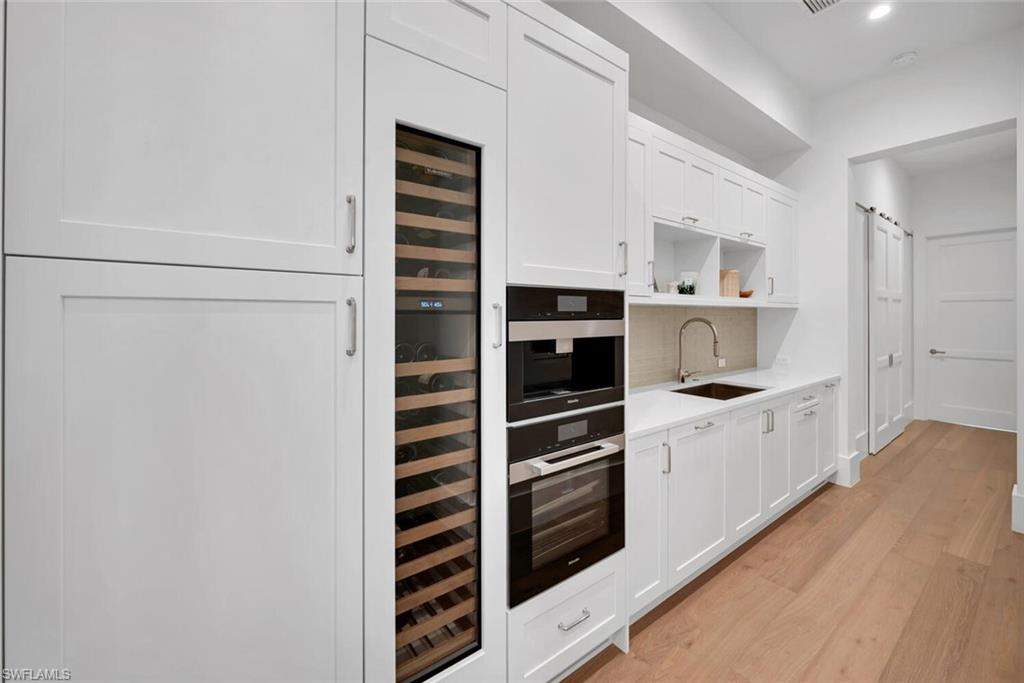 330 Broad Avenue North Naples, FL 34102 - Photo 14 of 49 Butler Pantry w/ Daily storage, Steam Over, Espresso station, wine refrigerator, ice maker and more.