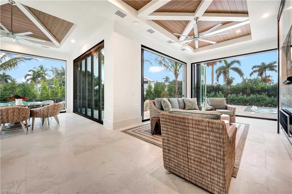 330 Broad Avenue North Naples, FL 34102 - Photo 22 of 49 Indoor/Outdoor living. Air-conditioned with electric screens.