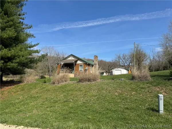 $240,000 | 33092 Lake Trail Road, Gravois Mills, MO 65037
