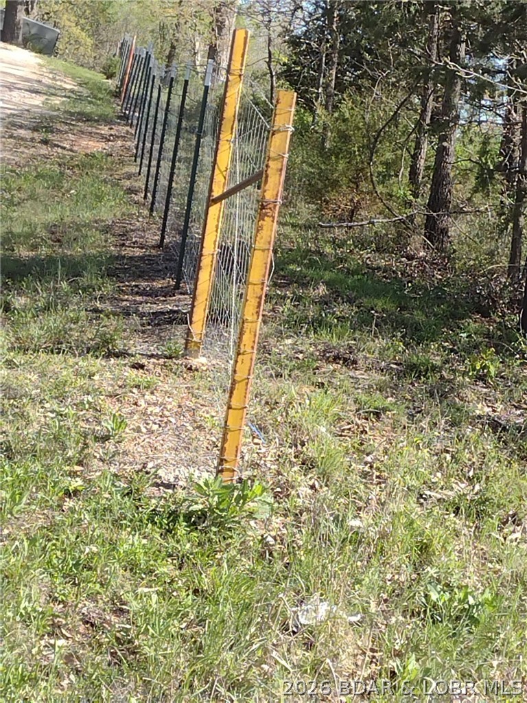 33092 Lake Trail Road Gravois Mills, MO 65037 - Photo 26 of 30 Fence line around the entire property