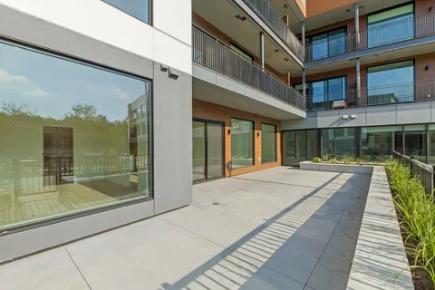 a view of a house with a large window