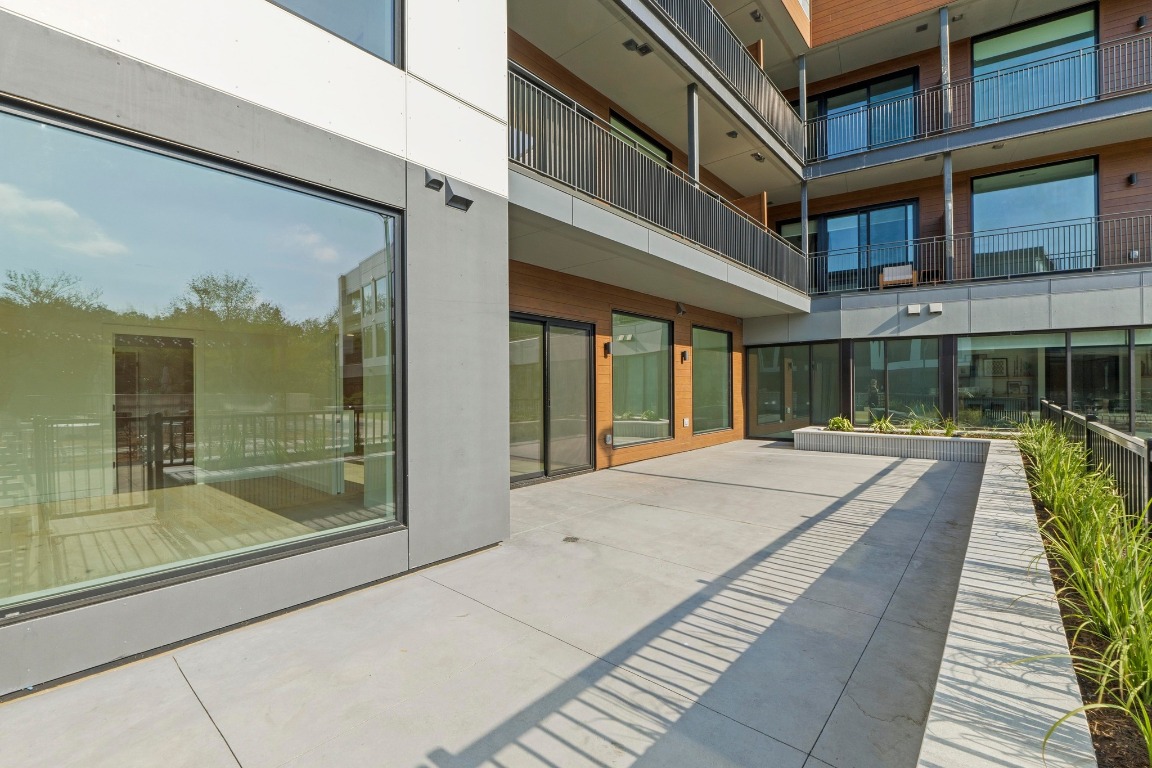 2209 South 1st Street, Unit 122 Austin, TX 78704 - Photo 1 of 40 a view of a house with a large window