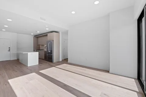 a view of a kitchen with a sink