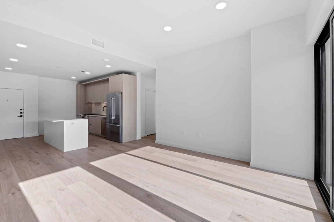 2209 South 1st Street, Unit 122 Austin, TX 78704 - Photo 7 of 40 a view of a kitchen with a sink
