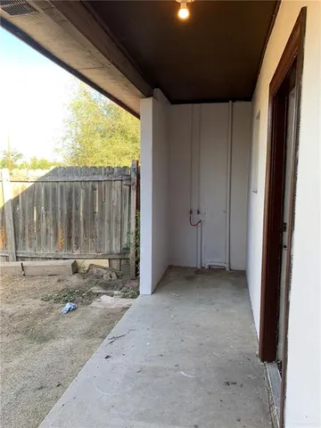 a bathroom with a sink vanity and mirror