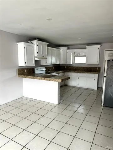 a view of a backyard with a garden