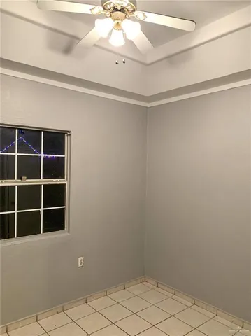a view of a livingroom with a dishwasher and cabinets