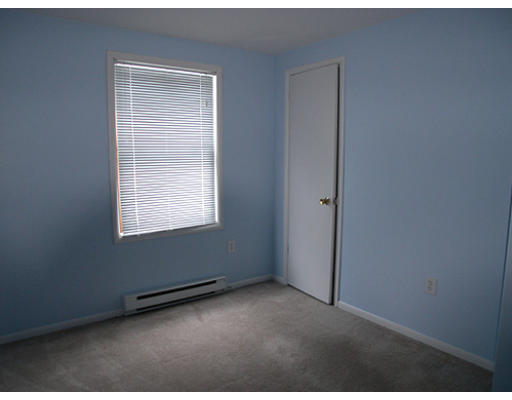11 Clement Road Townsend, MA 01469 - Photo 6 of 8 an empty room with windows