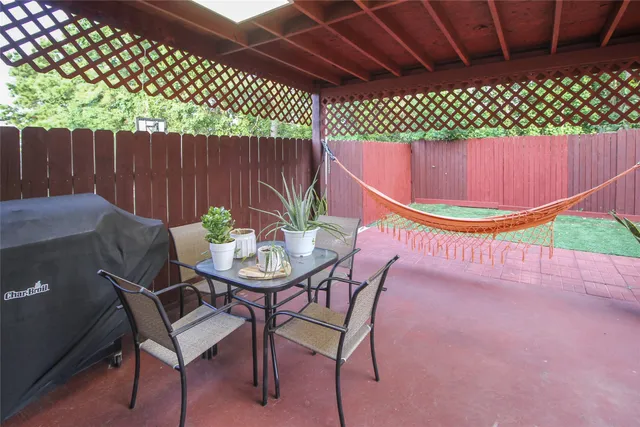 a view of house with a swimming pool