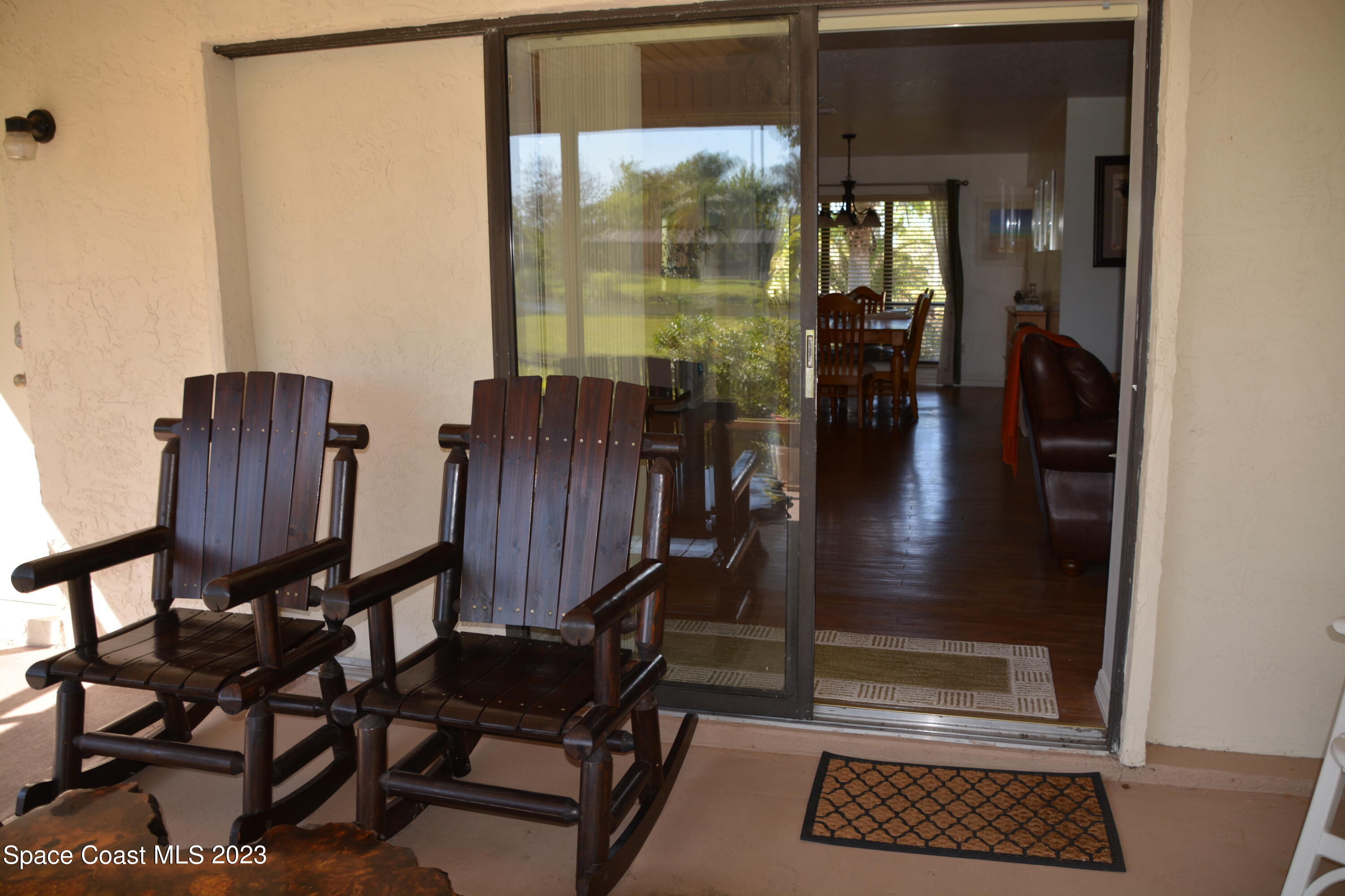 1045 Pine Island Road Merritt Island, FL 32953 - Photo 23 of 42 a view of a hallway with seating area